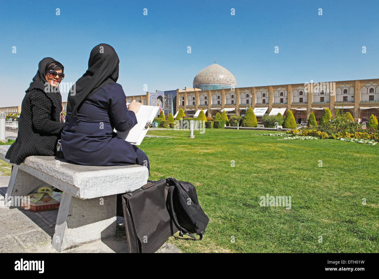 Female students on Imam Square drawing the dome of Lotfollah Mosque, Isfahan, Isfahan Province, Persia, Iran Stock Photo