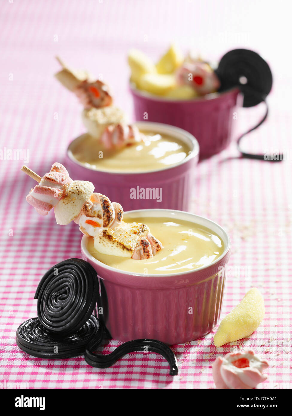 Cream dessert with candies Stock Photo Alamy