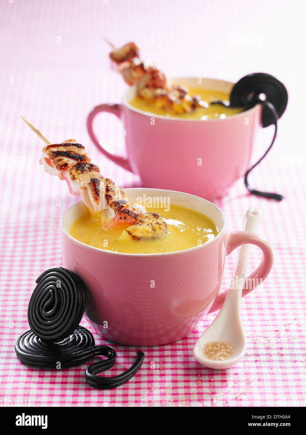 Cream dessert with candies Stock Photo Alamy