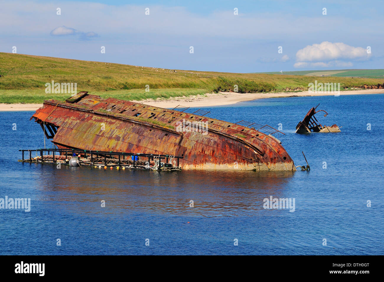 World War II boat intentionally sunk to protect the natural harbour of Scapa Flow, South Ronaldsay, Orkney, Scotland Stock Photo