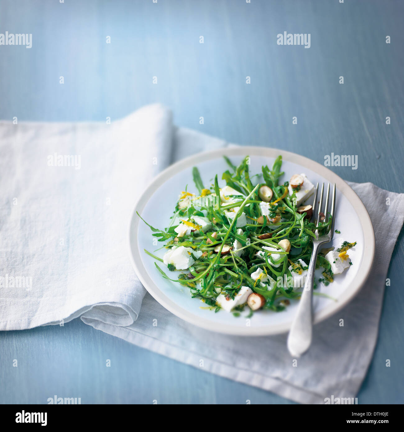 Rocket lettuce and goat's cheese salad Stock Photo Alamy