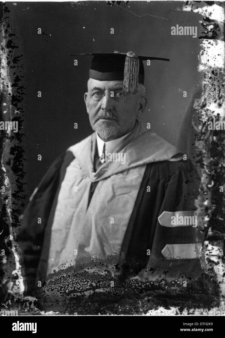 This portrait of President William Boyd of Western College, captured in cap and gown, highlights his leadership and academic role. The photograph reflects the formal tradition of college administration. Stock Photo