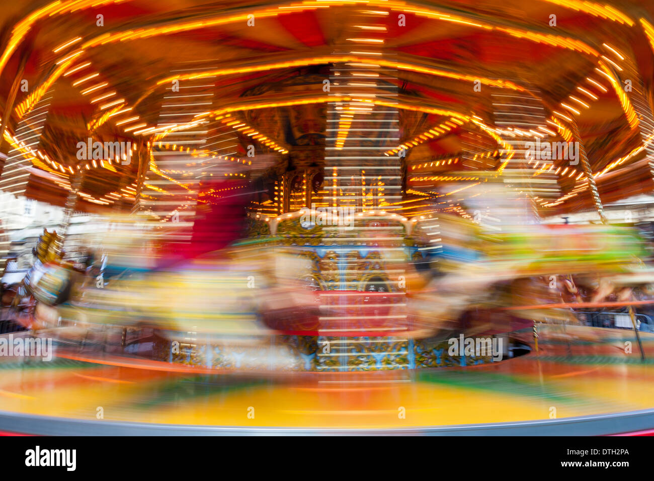 Carousel With Rider Riders become a blur as they ride on a merry-go-round (carousel Stock ...