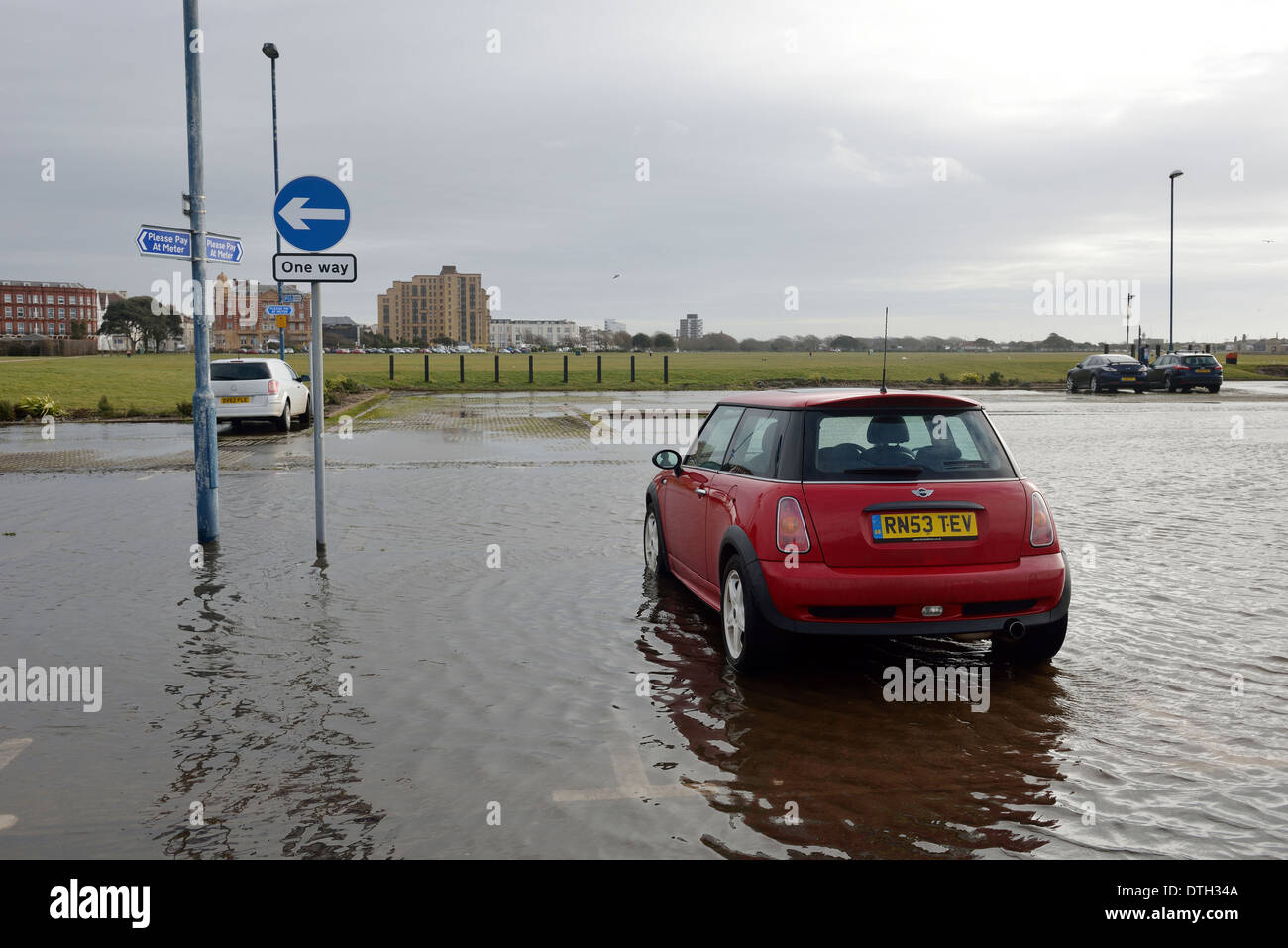 Flooded car park at Southsea, Portsmouth, Hampshire. UK Stock Photo
