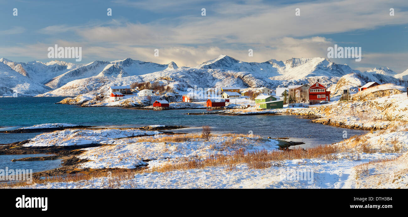 Sommaroy, Tromso county, Norway : scattered houses by the sea during arctic winter Stock Photo