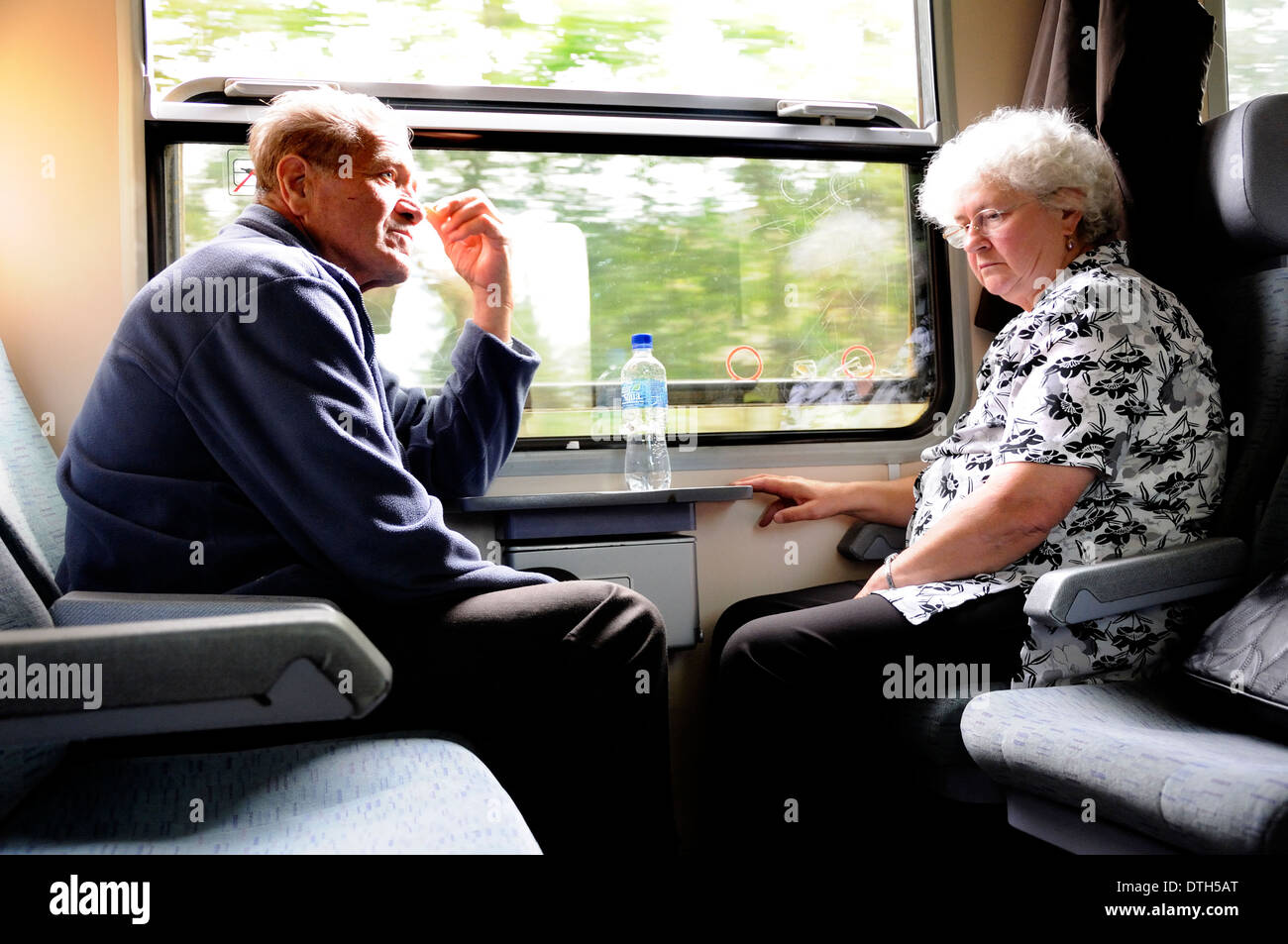 Budapest, Hungary. Old couple on a train Stock Photo