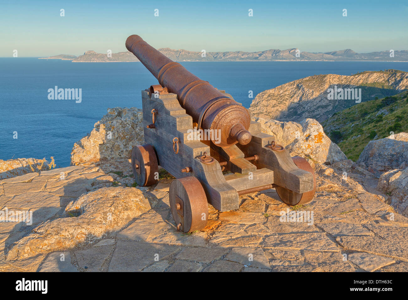 Old iron cannon at the top of Penya del Migdia. La Victoria area, Alcúdia region. Majorca, Balearic islands, Spain Stock Photo