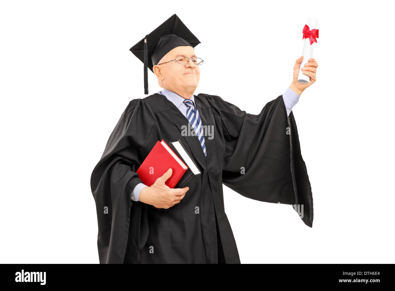 Proud mature student holding a diploma Stock Photo