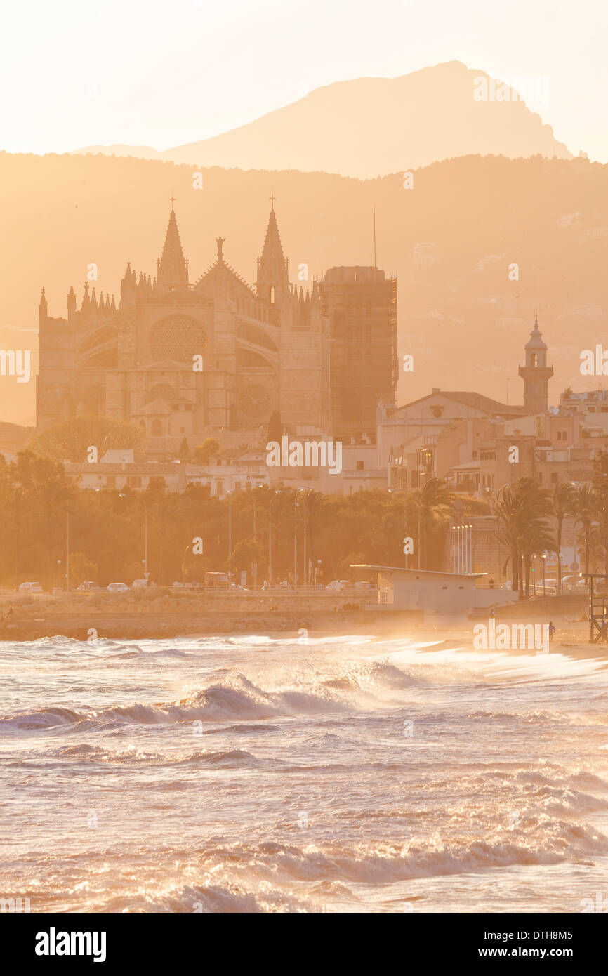 13th century cathedral of Palma de Majorca. East facade at sunset. View from Can Pere Antoni beach. Balearic islands, Spain Stock Photo