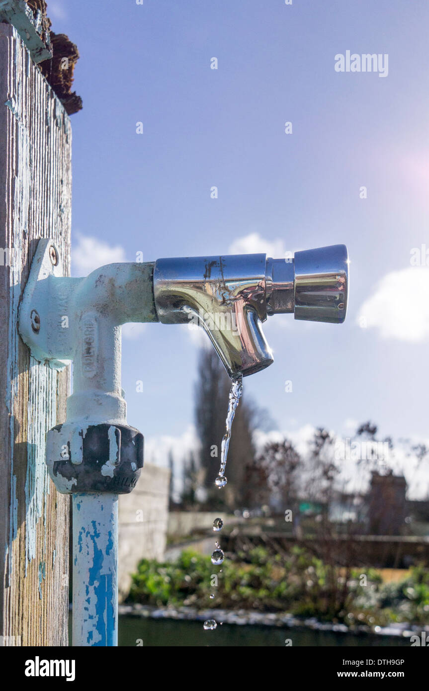 Stand pipe with dripping tap Stock Photo Alamy