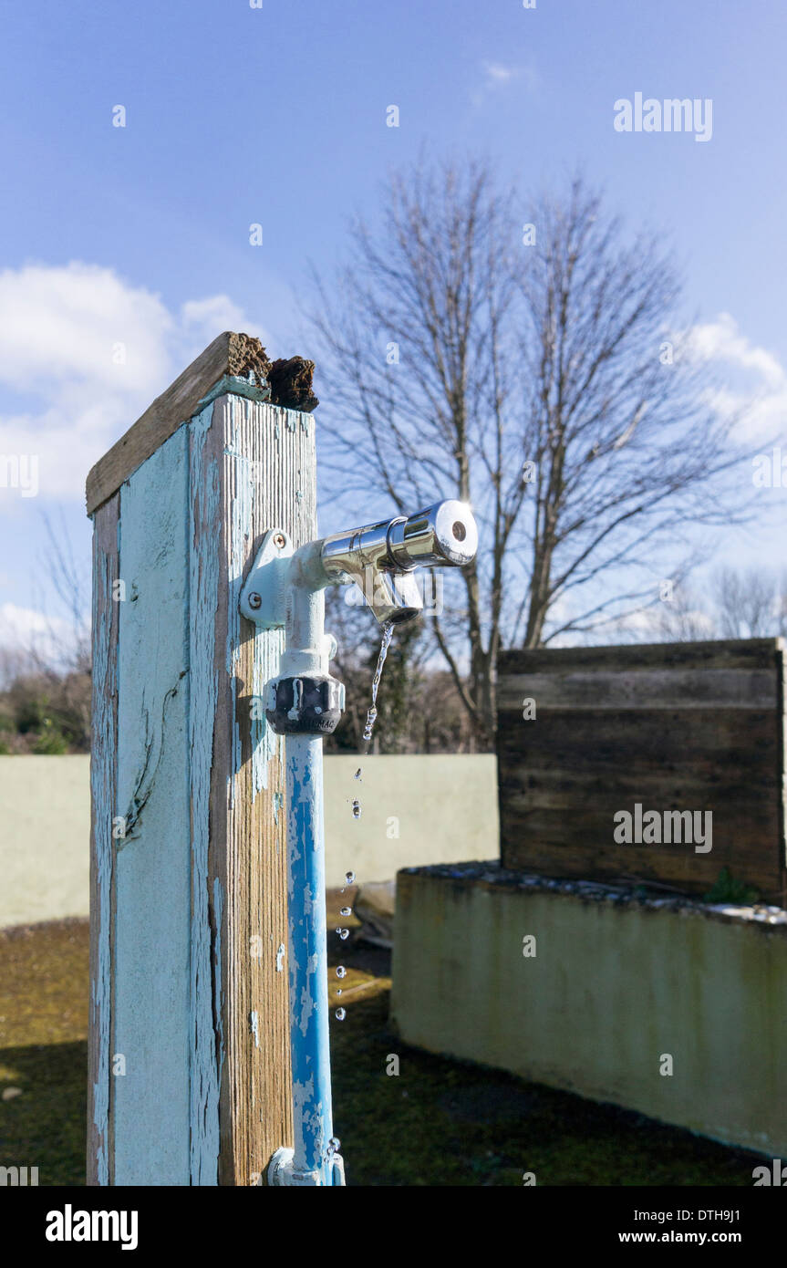 Stand pipe with dripping tap Stock Photo Alamy