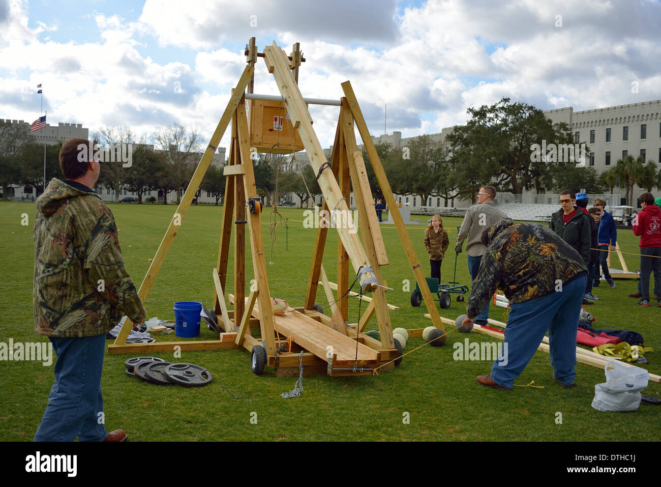 Loading projectile onto catapult Stock Photo