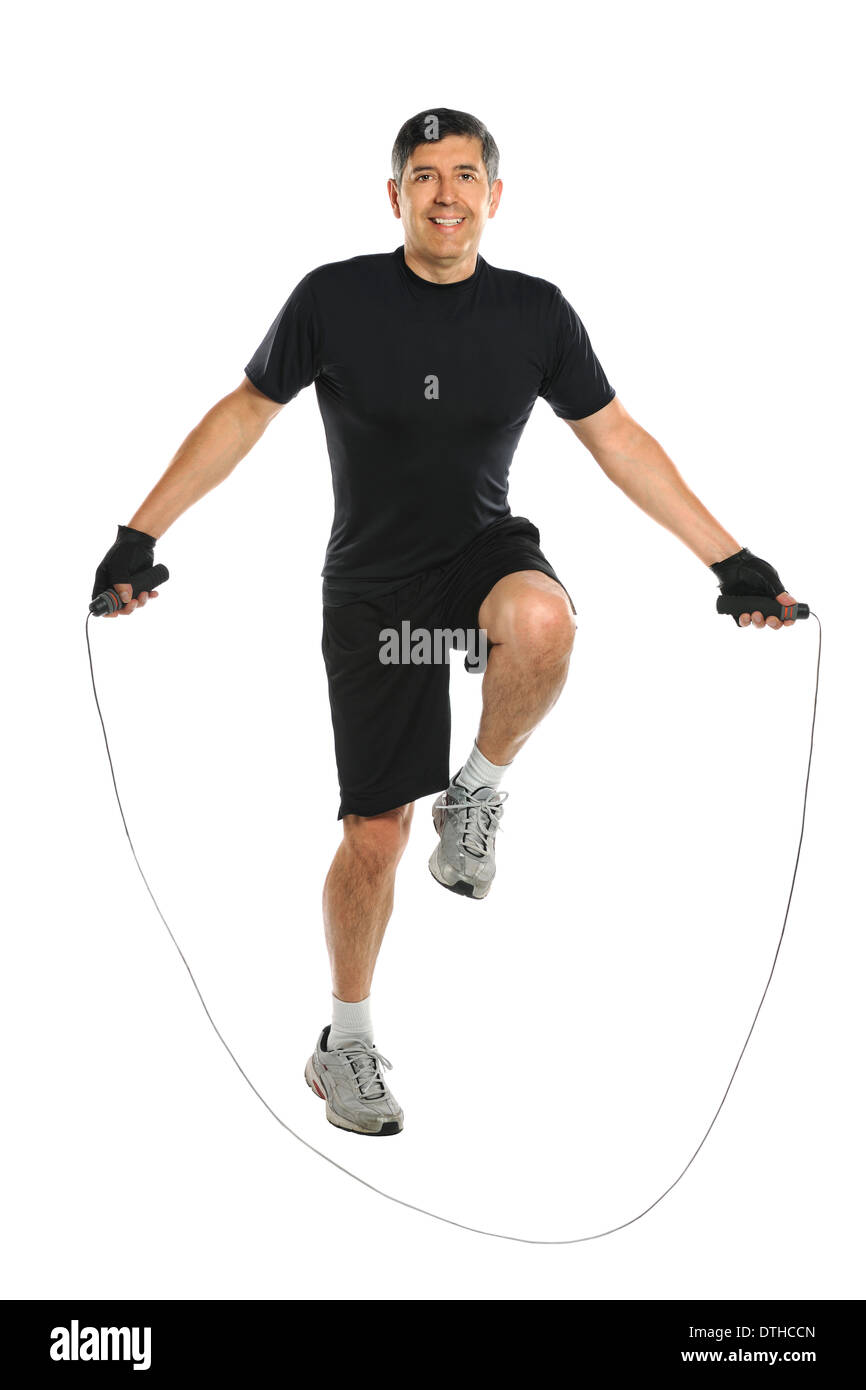 Active Hispanic senior jumping rope isolated over white background