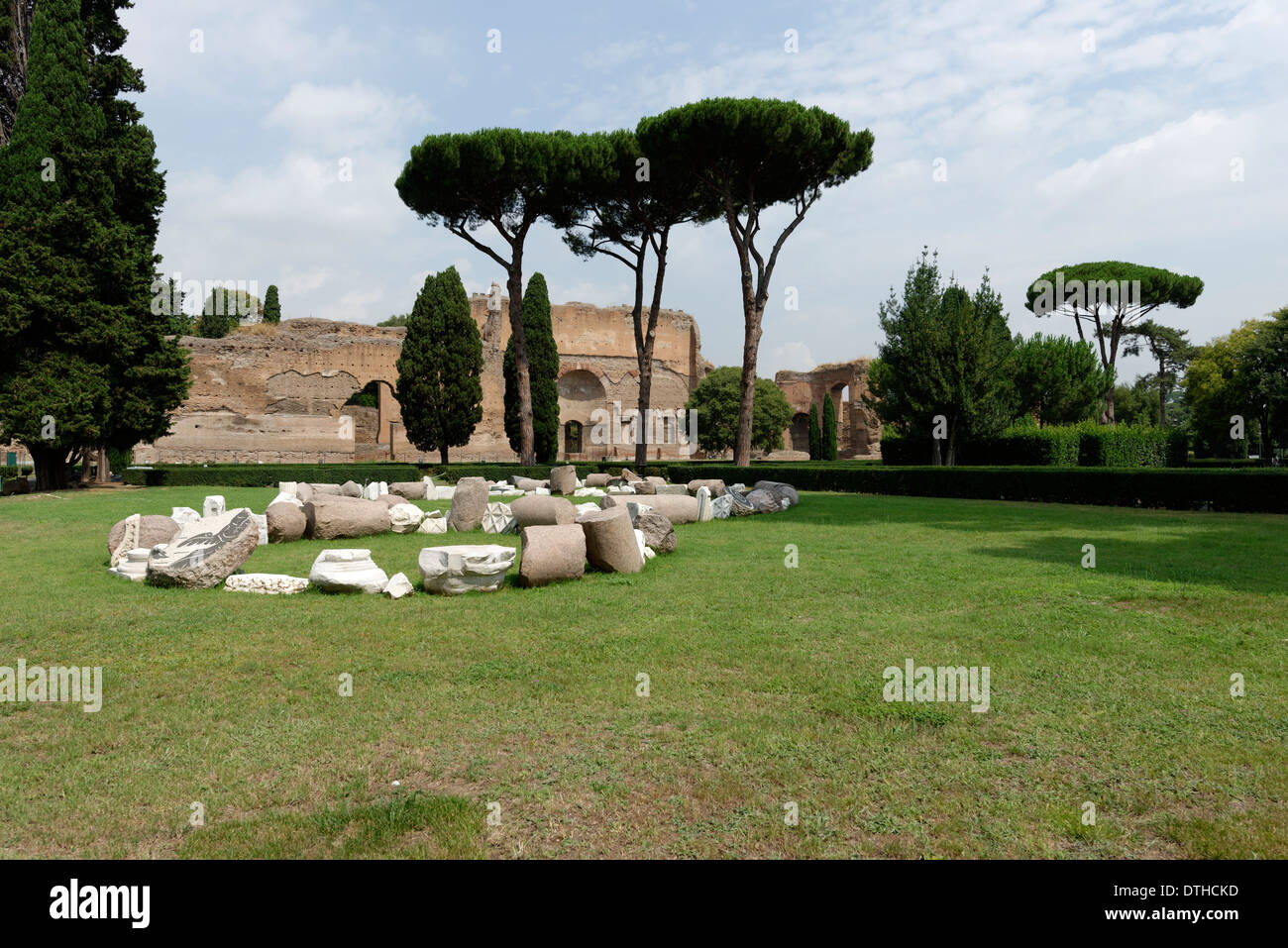 View over garden pine trees to ruins buildings along outer west wall Baths Caracalla Rome Italy Stock Photo