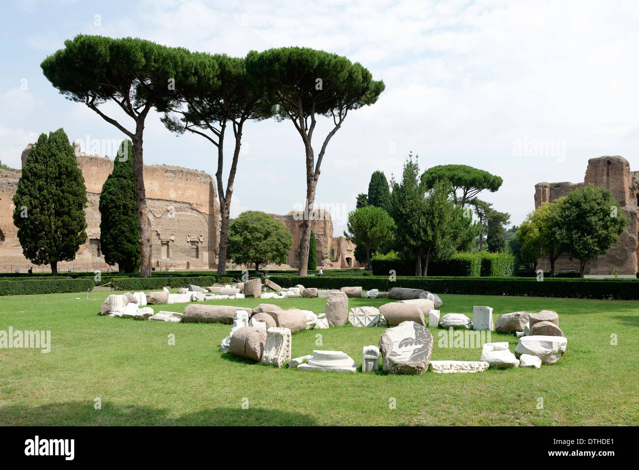 View over garden pine trees to ruins buildings along outer west wall Baths Caracalla Rome Italy Stock Photo