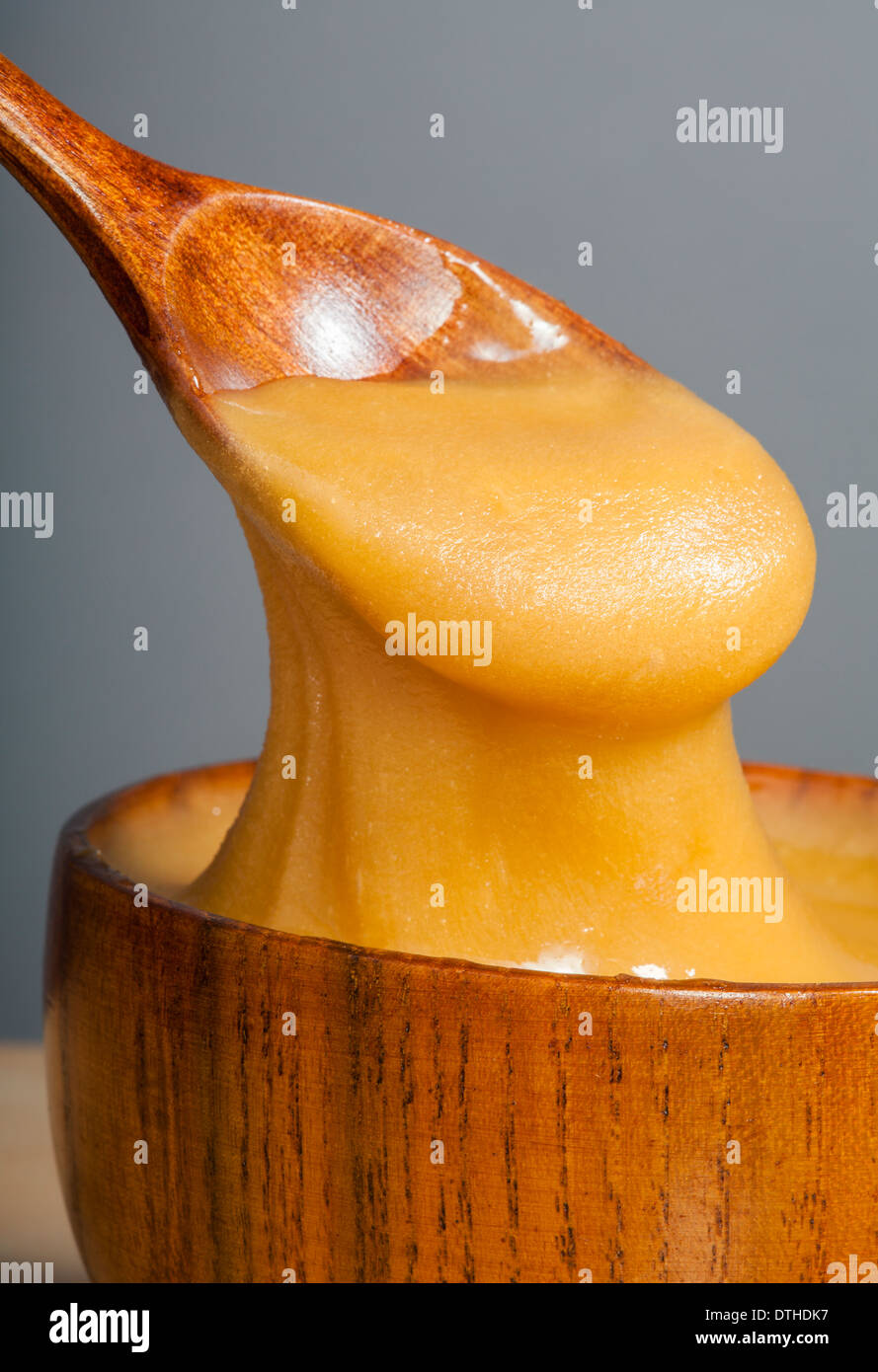 Golden honey hi-res stock photography and images - Alamy