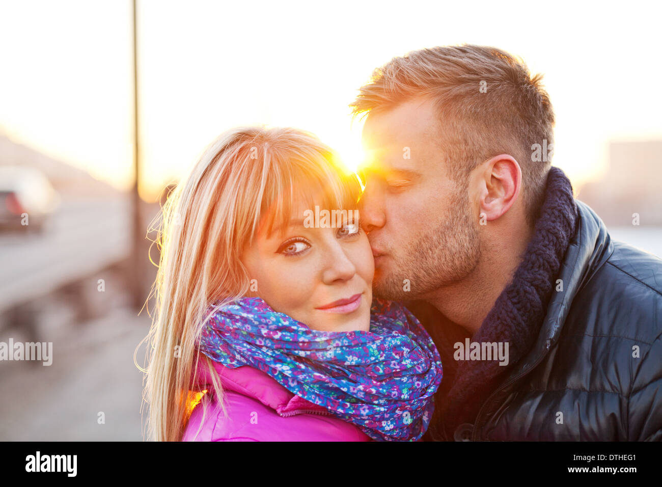 Beautiful woman kissing man hi-res stock photography and images - Alamy