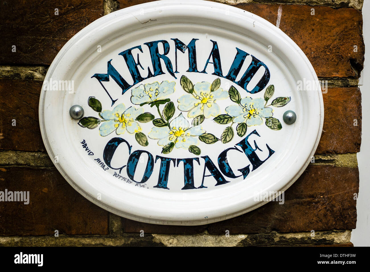 Cottage sign plate MERMAID COTTAGE in Rye UK Stock Photo