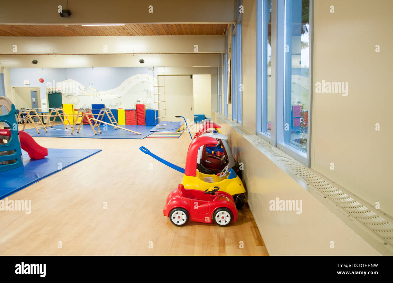 Children's toys inside a daycare play area Stock Photo