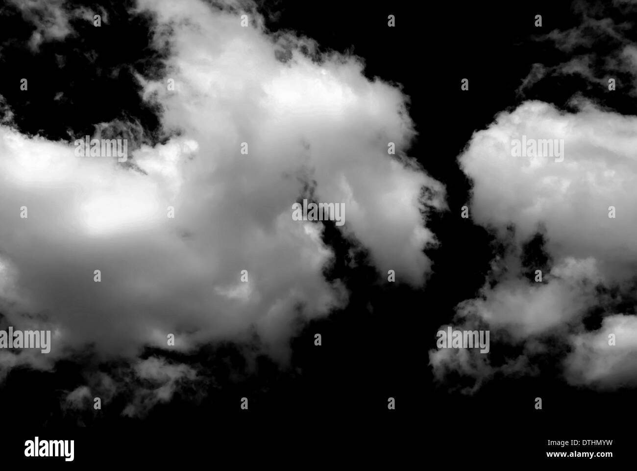 Monochrome sky with white fluffy clouds Stock Photo