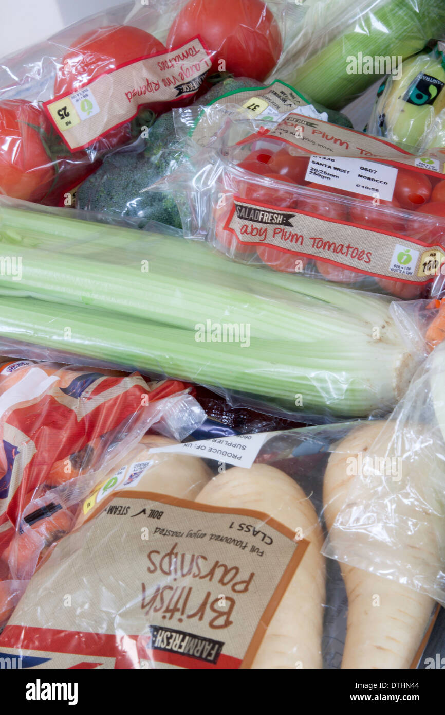 Supermarket vegetables in plastic/cellophane packaging, England, UK