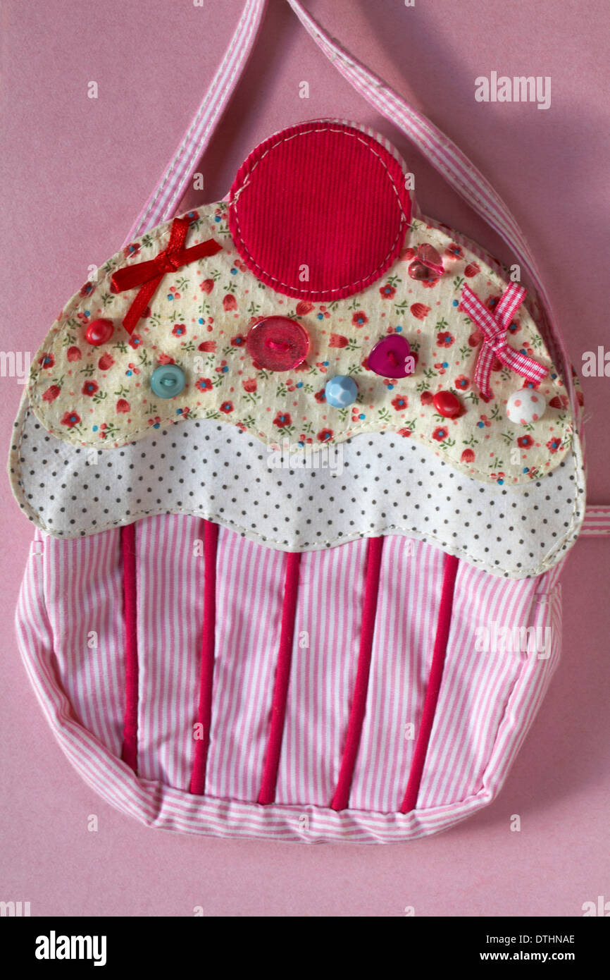 cupcake bag set on pink background Stock Photo