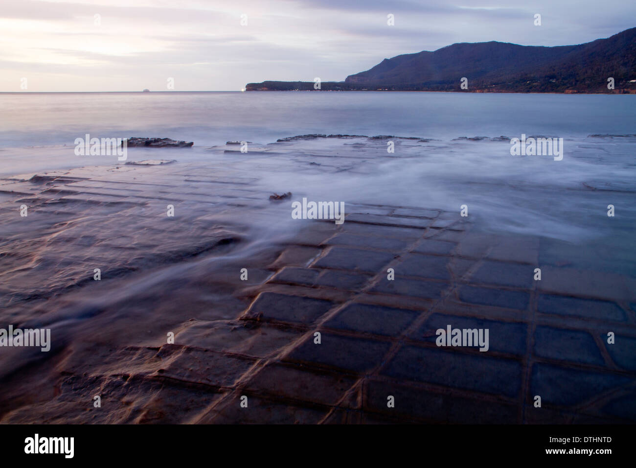 Dawn at the Tessellated Pavement, Eaglehawk Neck Stock Photo