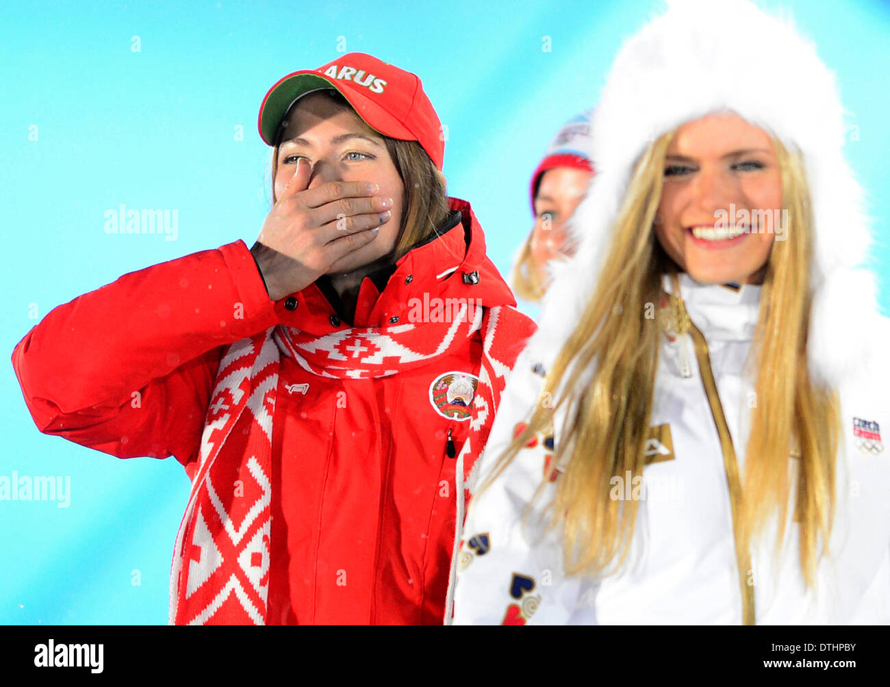 Sochi, Russia. 18th Feb, 2014. Left to right: Medalist in the women's biathlon 12.5K mass start, Gabriela Soukalova of the Czech Republic, silver, and Darya Domracheva of Belarus, gold, pictured during the medals ceremony at the 2014 Winter Olympics in Sochi, Russia, Tuesday, February 18, 2014. Credit:  Roman Vondrous/CTK Photo/Alamy Live News Stock Photo