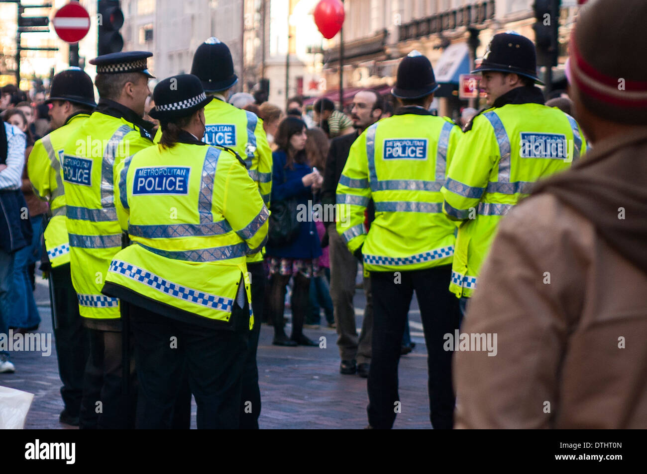 Group of British Policemen are patrolling in SOHO, London during the Chinese New Year celebration Stock Photo