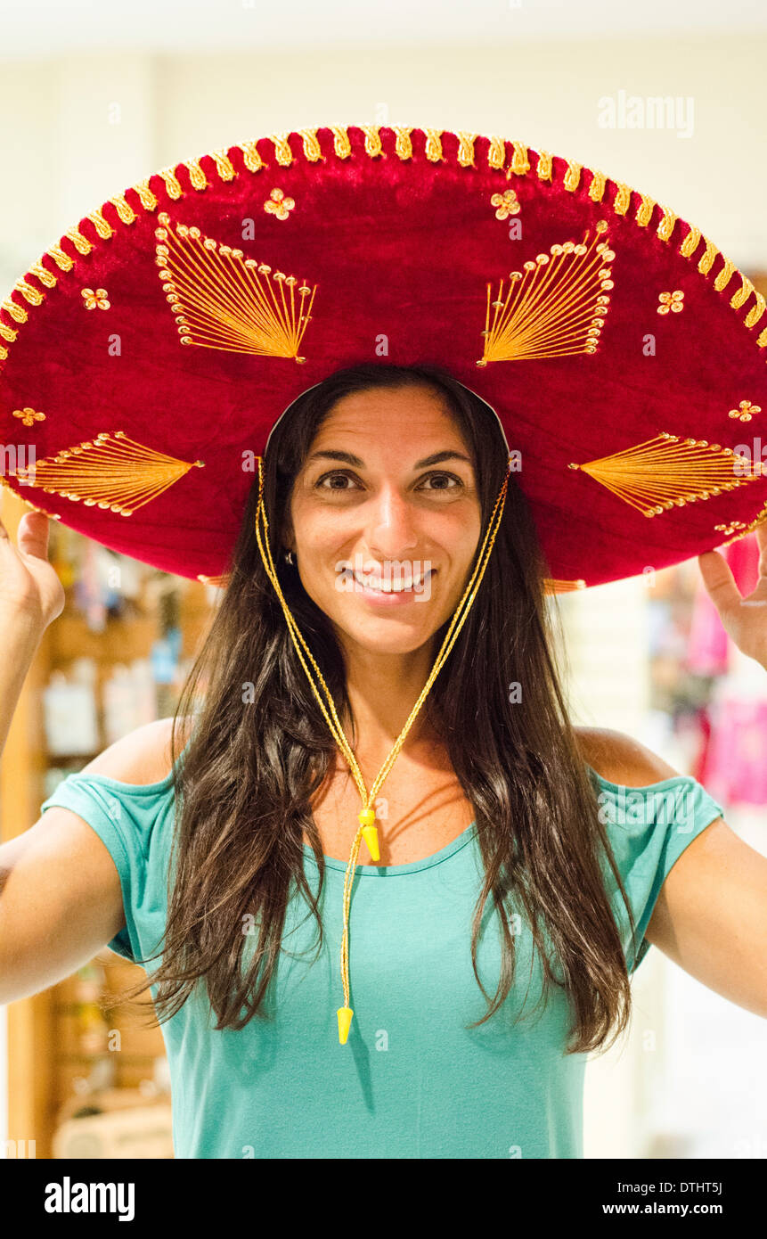 Woman in Mexican Mariachi Hat Stock Photo