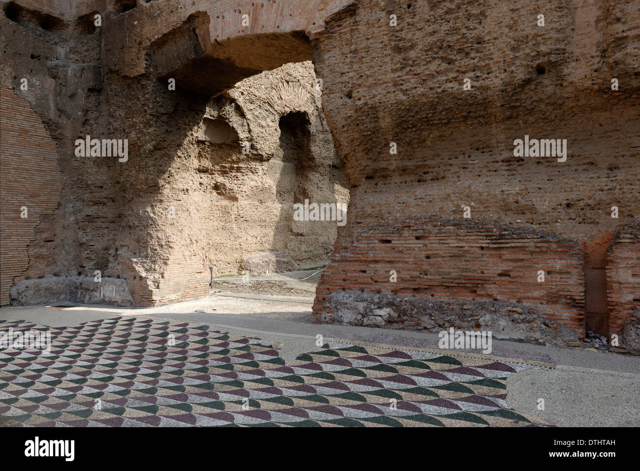 Flooring with coloured marble mosaic tesseras on Northern end eastern palaestra Baths Caracalla Rome Italy Stock Photo