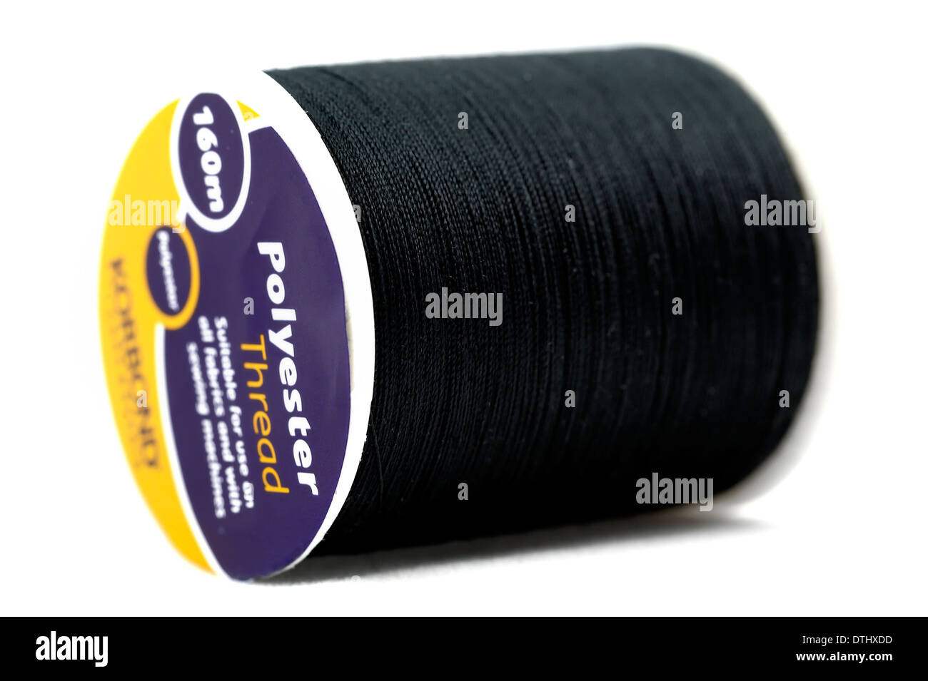 A 160m bobbin of polyester thread Stock Photo