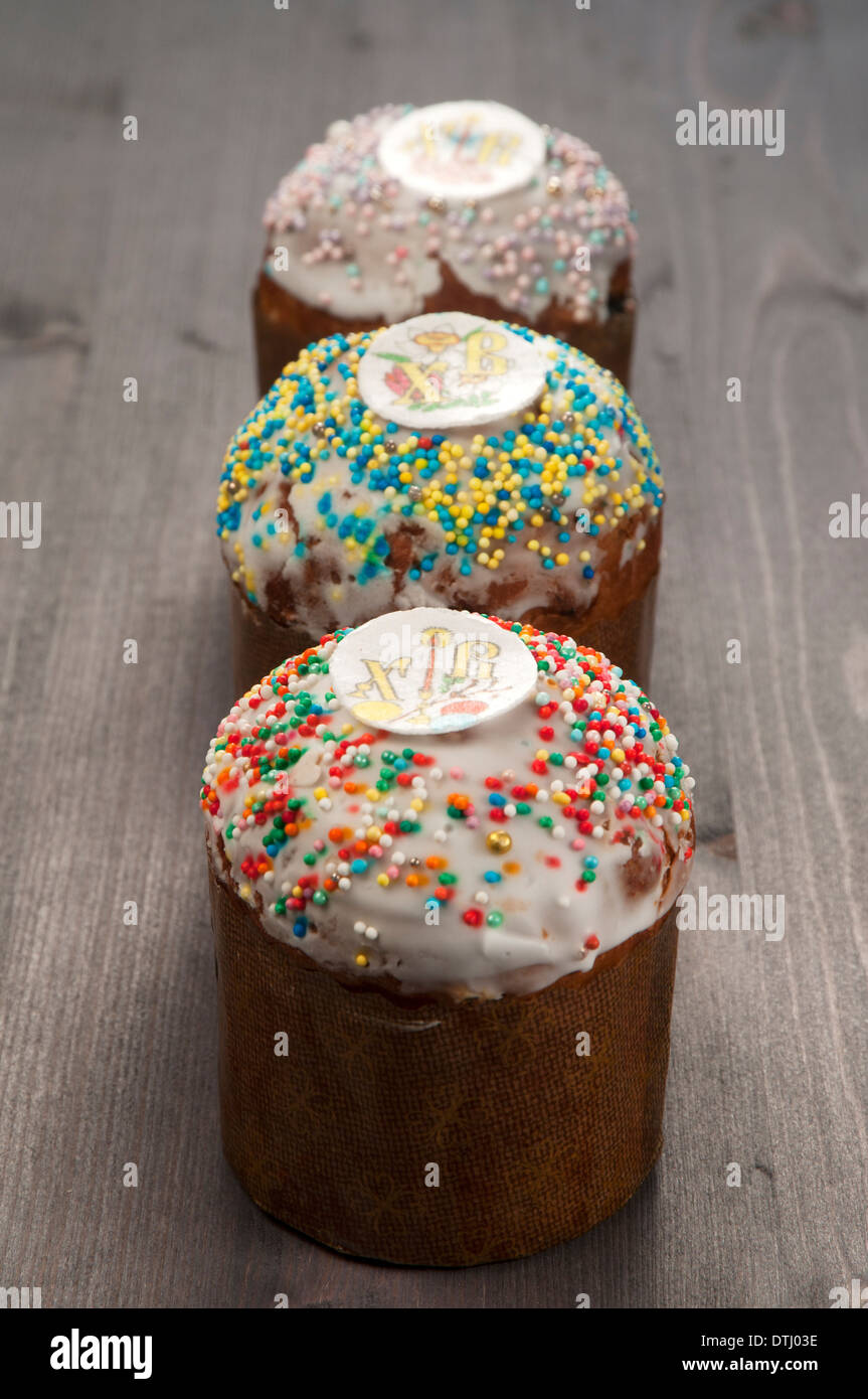 Three Easter cakes on a wooden table Stock Photo