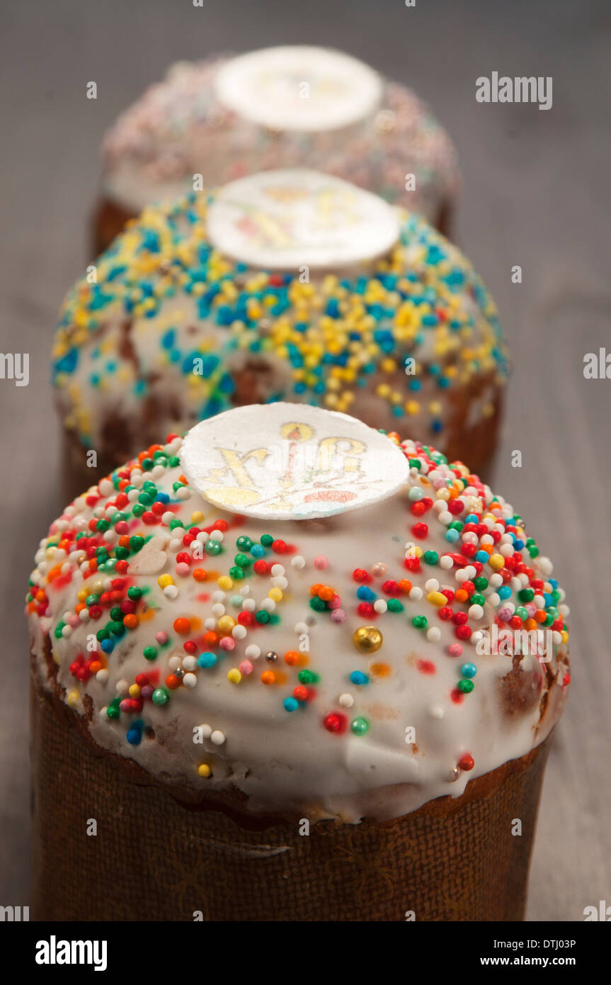 Three Easter cakes on a wooden table Stock Photo