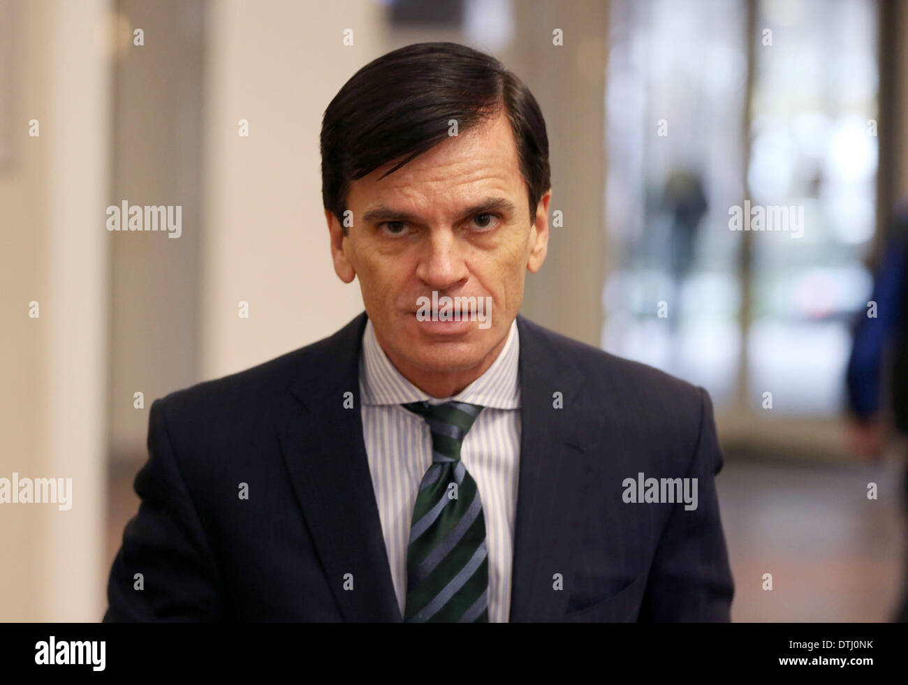 Cologne, Germany. 19th Feb, 2014. The head of investment bank Goldman Sachs in Germany, Alexander Dibelius, arrives at the court room of the district court in Cologne, Germany, 19 February 2014. Dibelius is a witness in the Sal. Oppenheim trial. Photo: OLIVER BERG/dpa/Alamy Live News Stock Photo