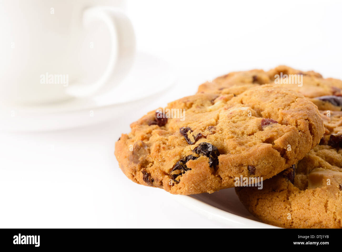 Food: fresh homemade cookies and teacup, on white background Stock Photo