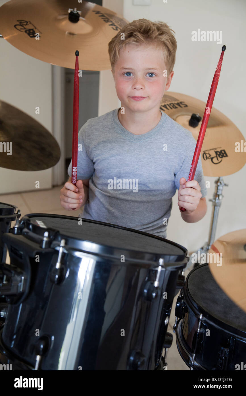 Boy playing drums hires stock photography and images Alamy