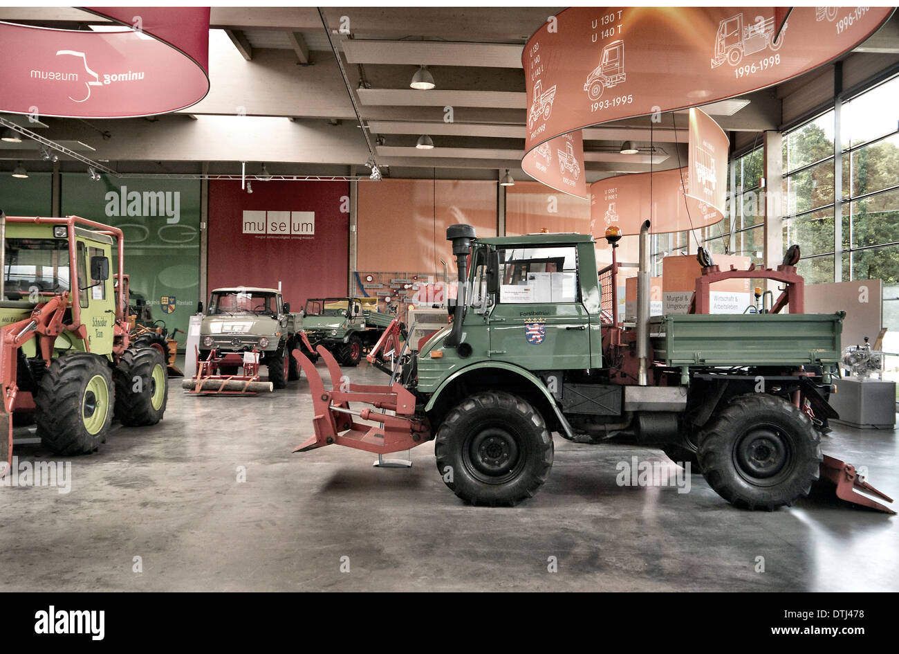 Unimog Museum Gaggenau Germany. A row of early model Umimog AWD vehicles with snow moving equipment fitted Stock Photo