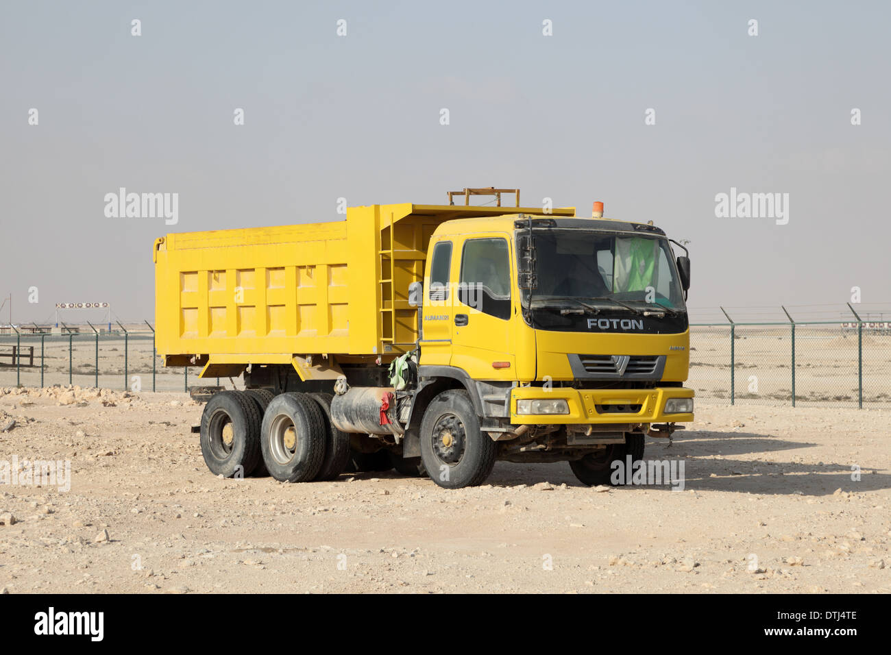 Foton Auman 320 - Chinese tip truck on a construction site in Doha, Qatar Stock Photo