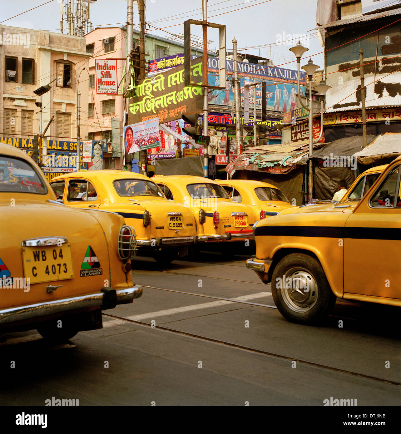 Yellow taxis in Kolkata Calcutta in West Bengal in India in South Asia. Car Cars Traffic Transport City Cities Life Urban Taxi Travel Wanderlust Stock Photo