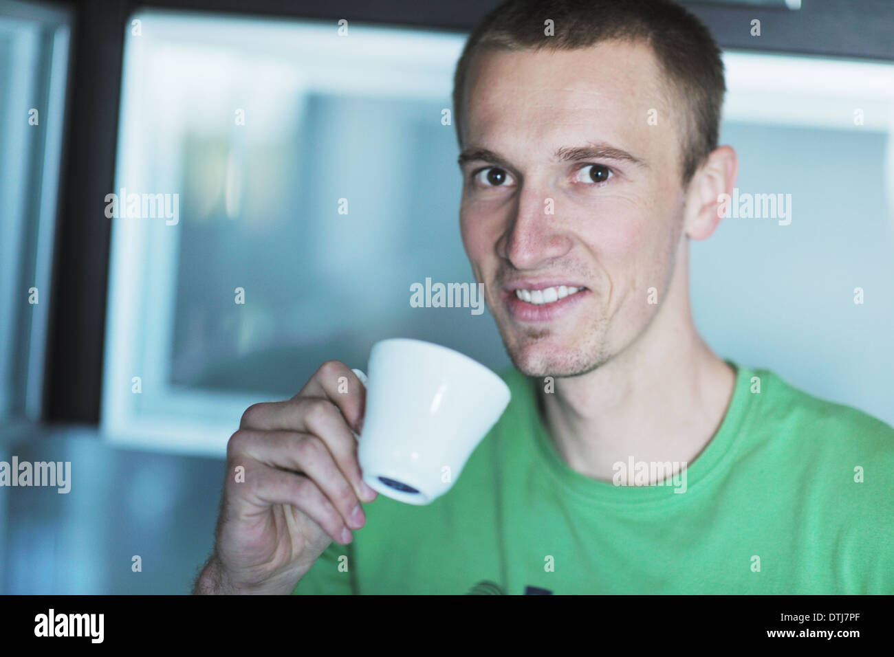 handsome young man drink fresh morning coffee Stock Photo