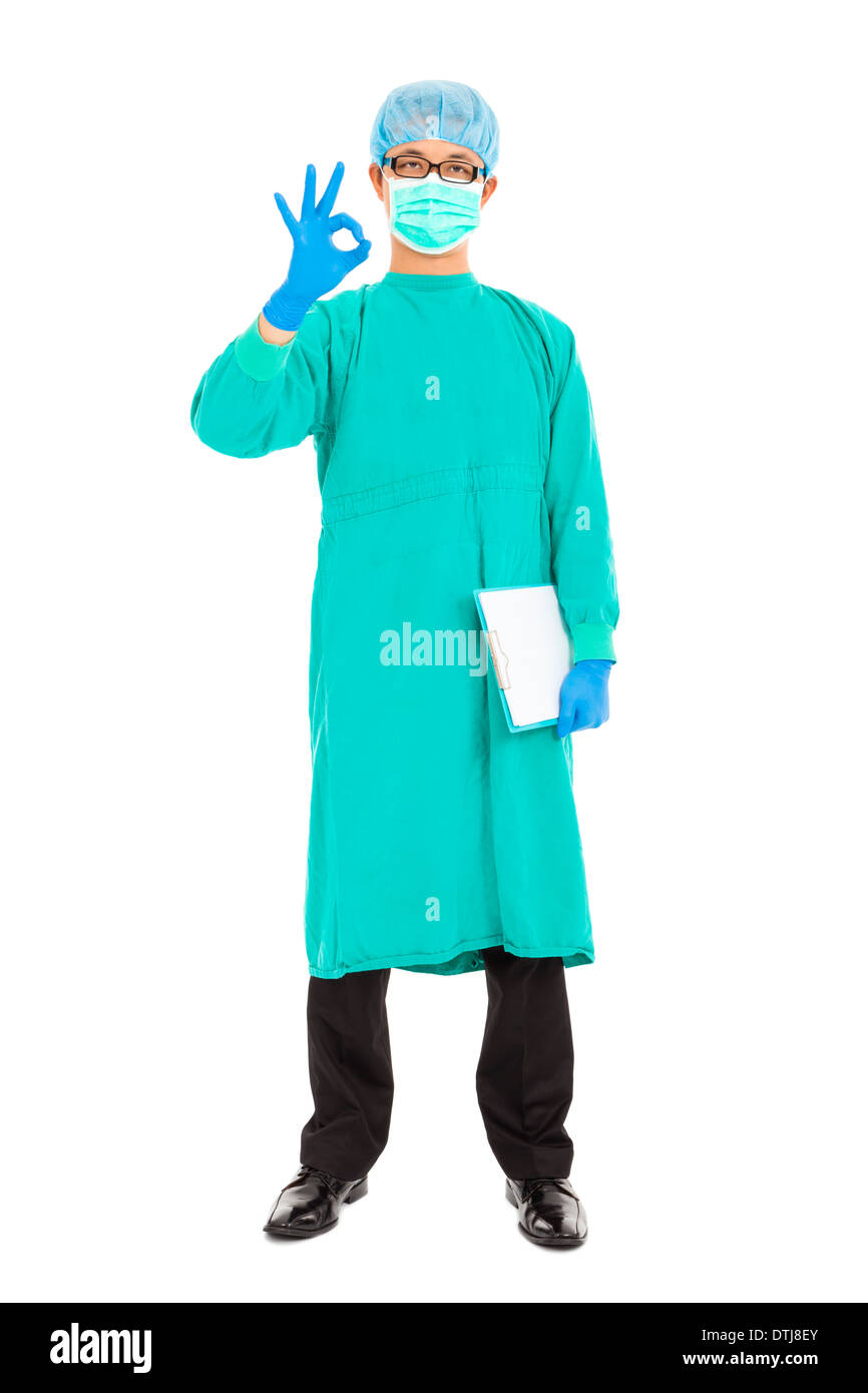 portrait of surgeon or checker in mask and thumb up in studio Stock Photo