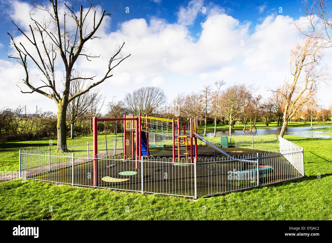An empty childrens playground in Essex in England in the UK, Europe Stock Photo