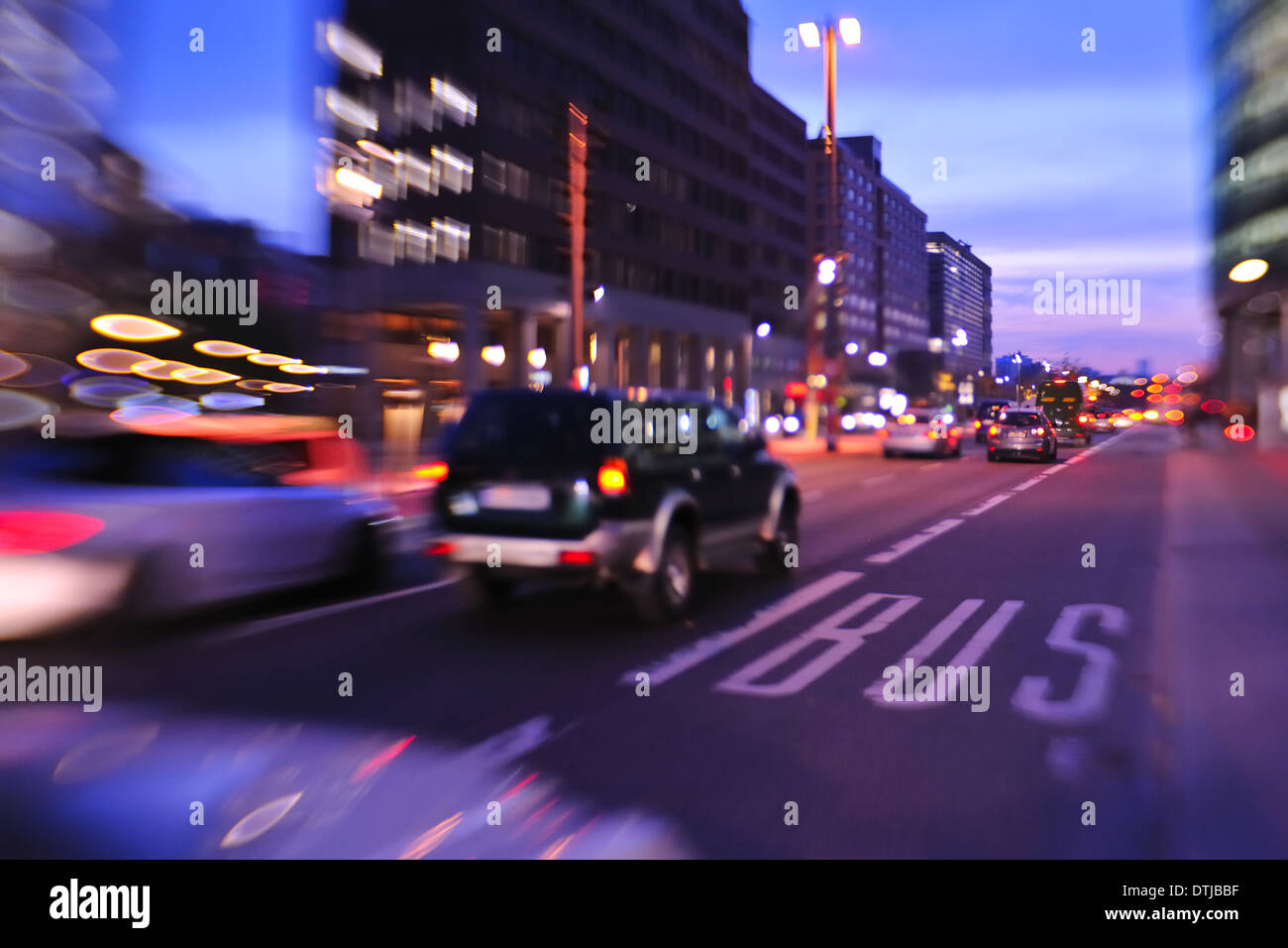City night with cars motion blurred light in busy street Stock Photo ...