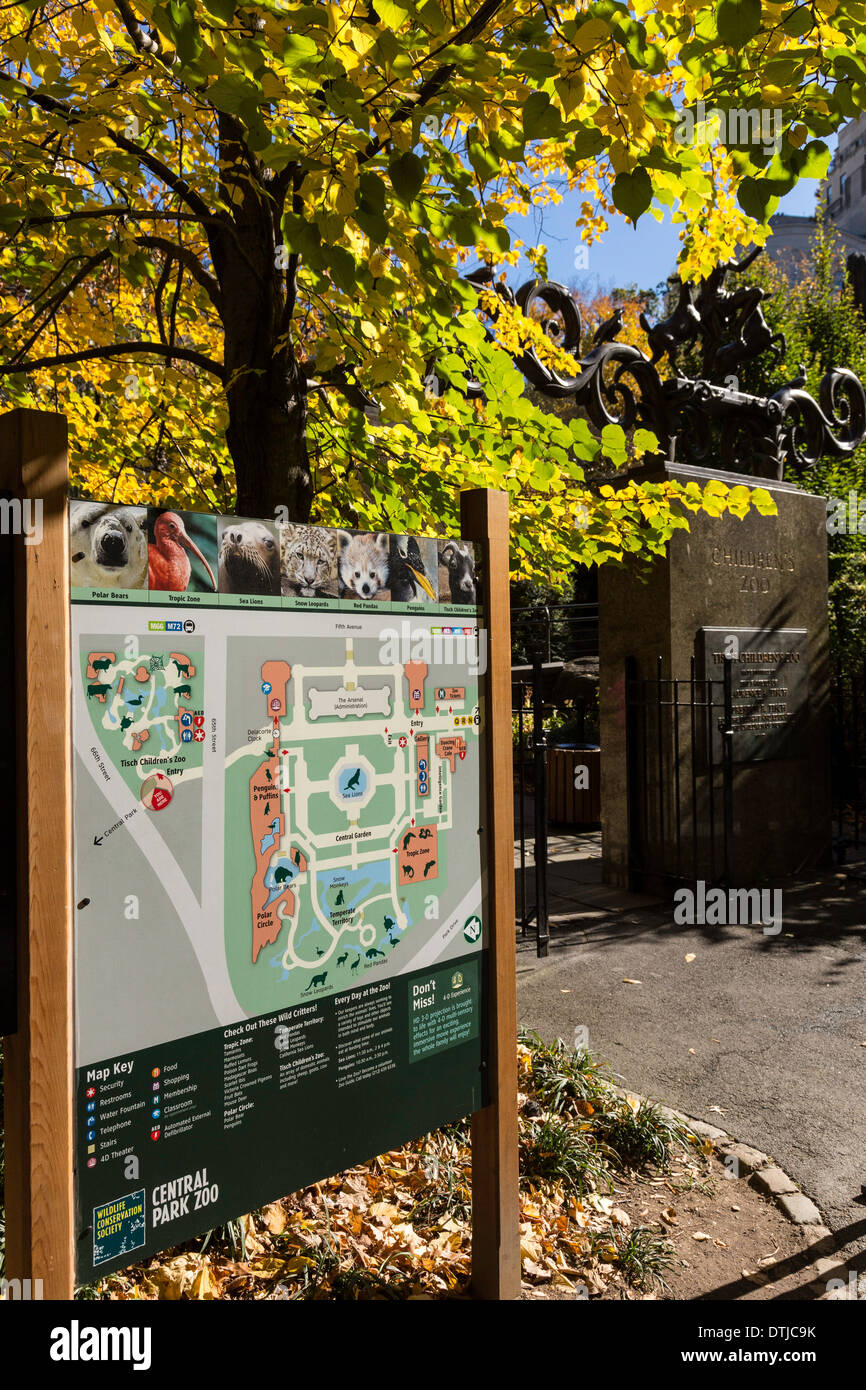Zoo Directory Sign in Central Park with Tisch Children's Zoo in the Background, NYC Stock Photo