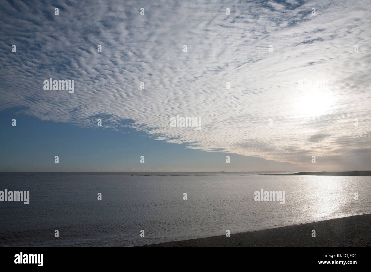 A mackerel sky or buttermilk sky of altocumulus clouds over Shingle