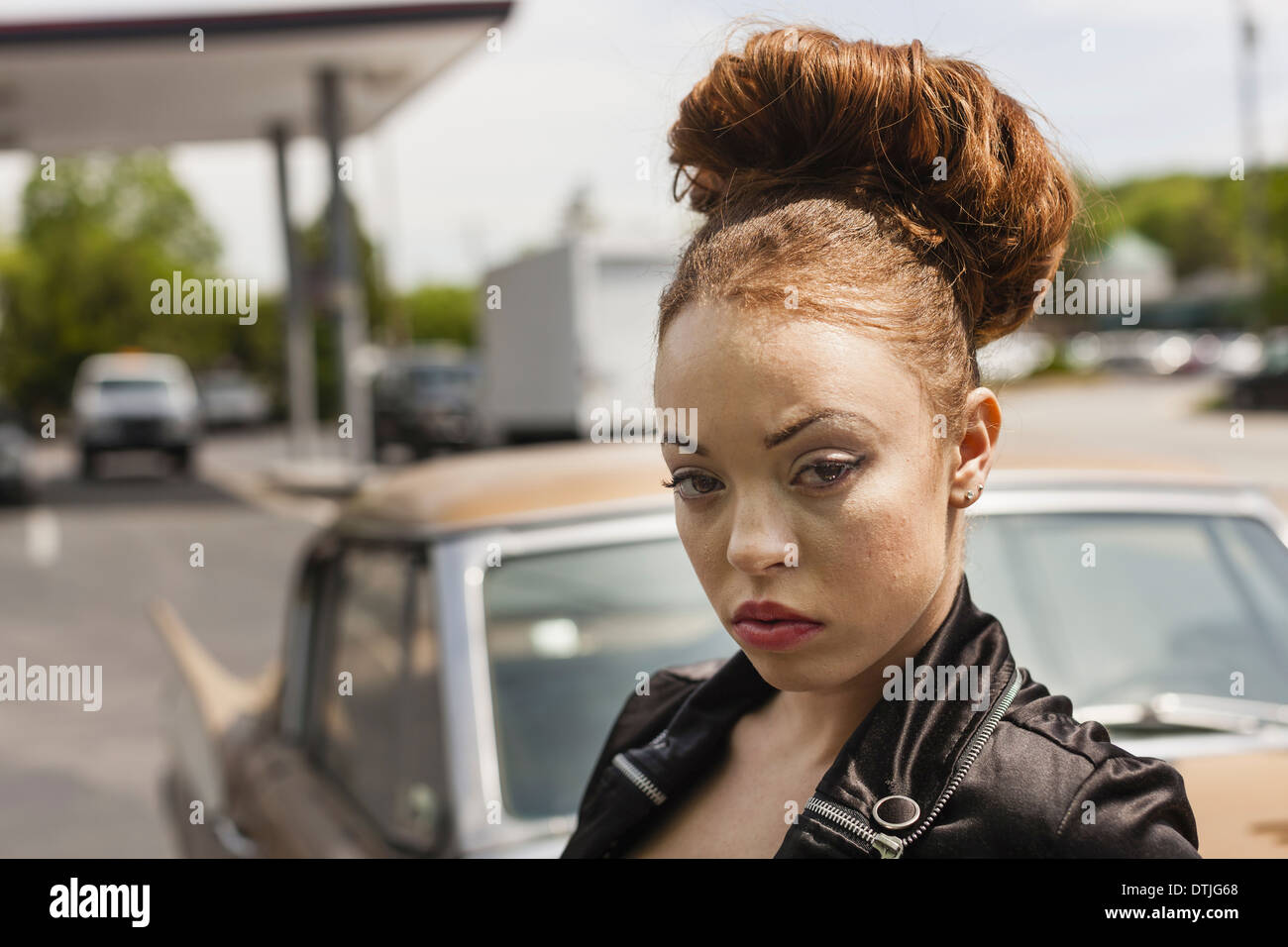 A young woman wearing makeup in a leather jacket  Pennsylvania USA Stock Photo