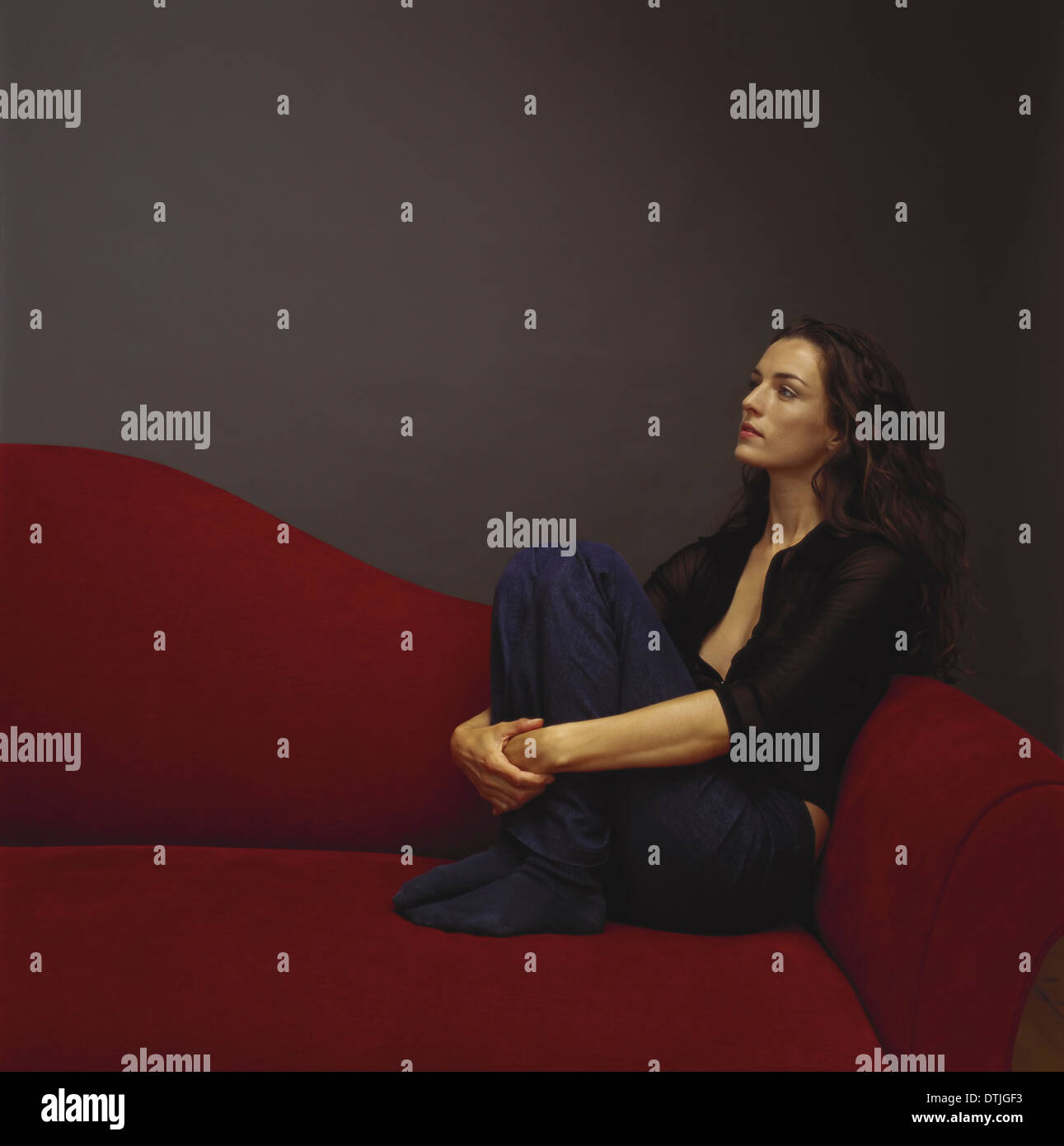 Seated black woman hi-res stock photography and images - Alamy