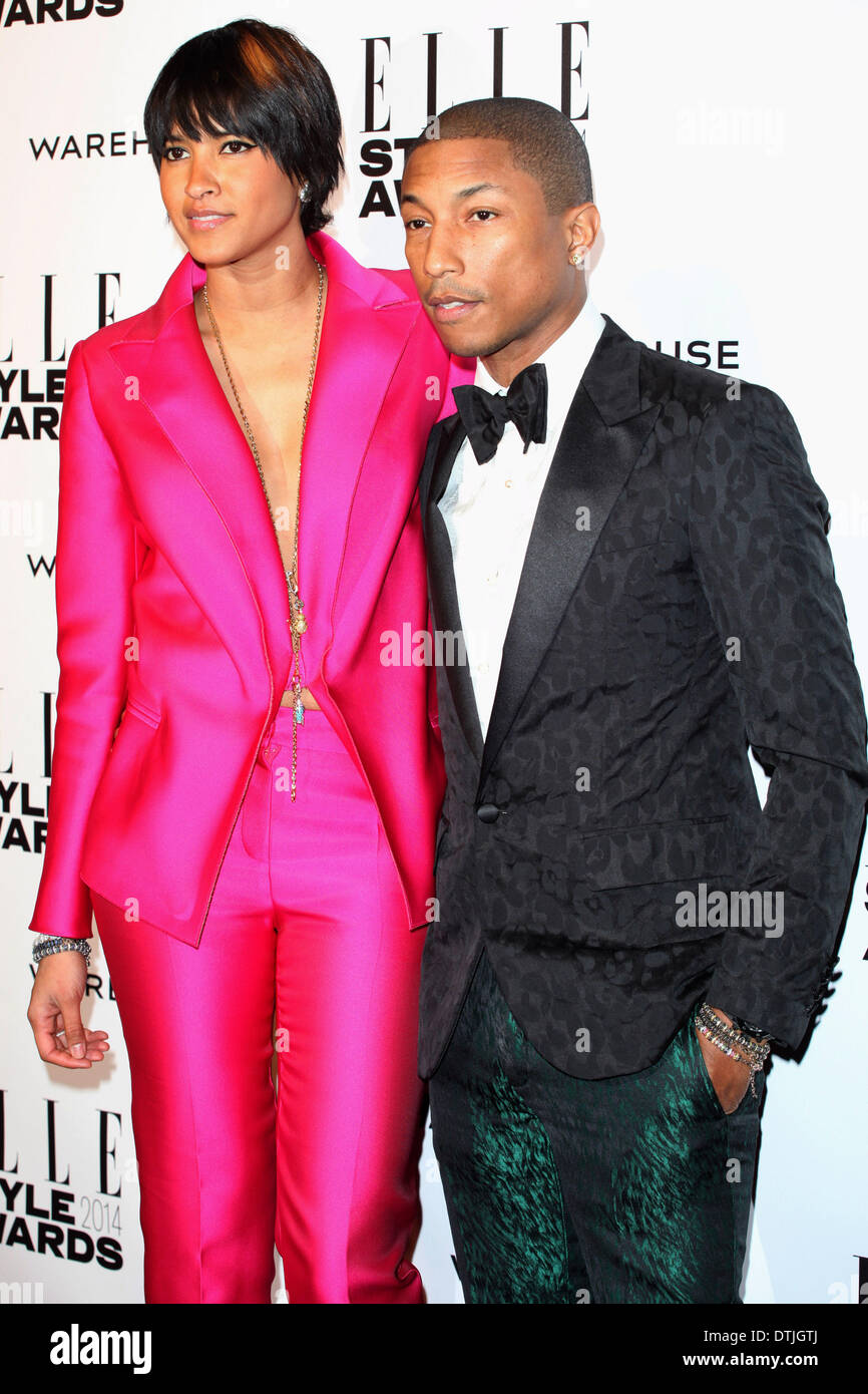 London, UK. 18th February 2014. Pharrell Williams and wife arriving for