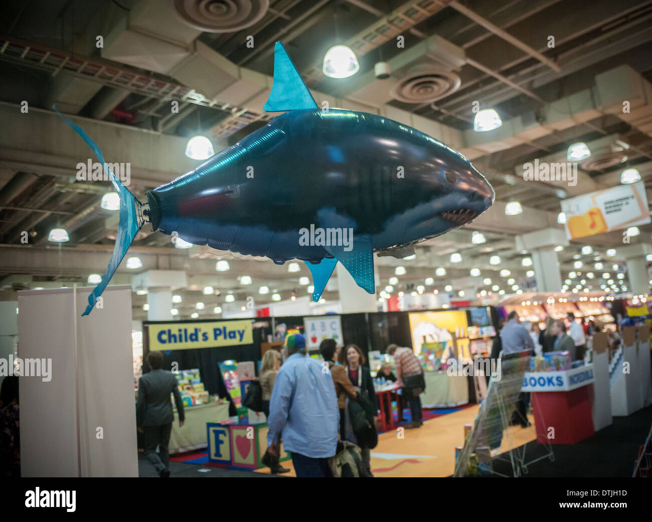 A helium-filled remote controlled "Air Swimmers" Great White Shark floats  above Toy Fair Stock Photo - Alamy